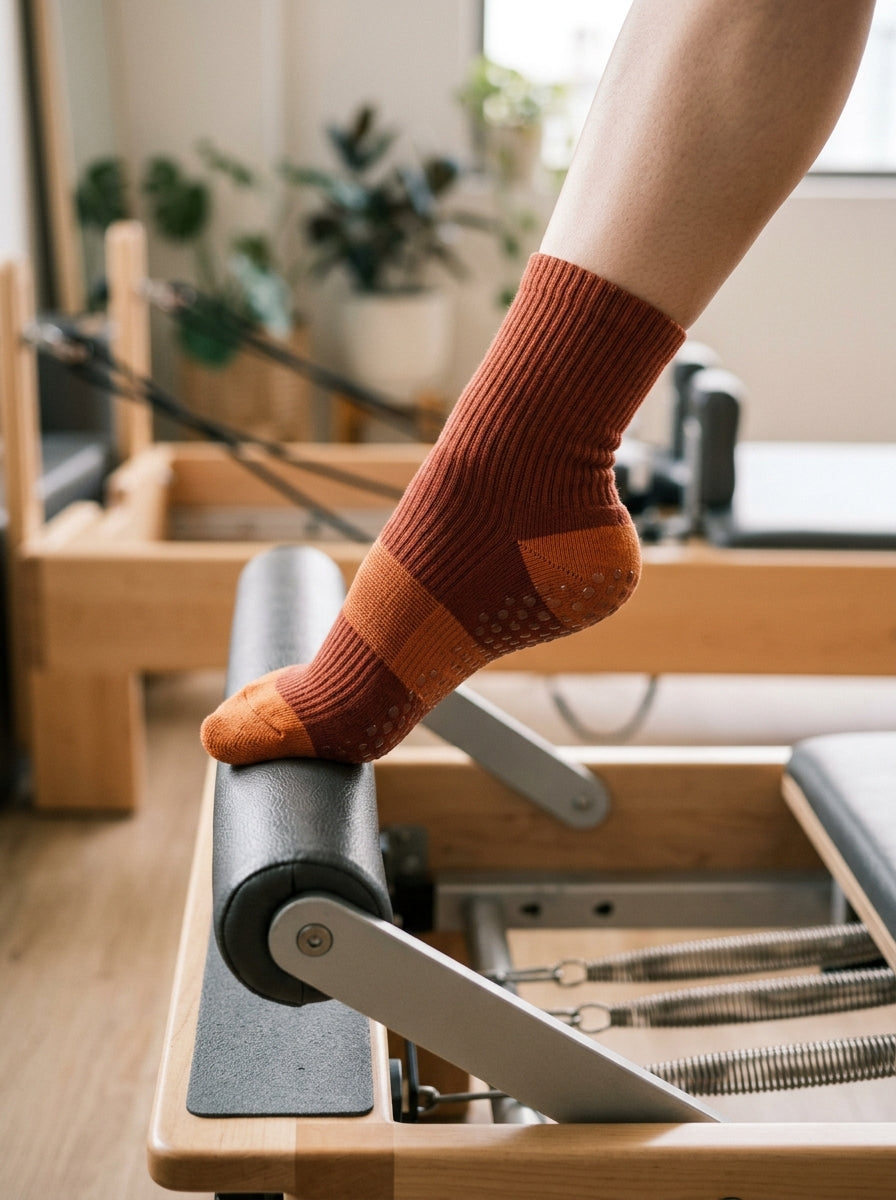 FA Socks Lifestyle - Orange Grip Socks on Footbar